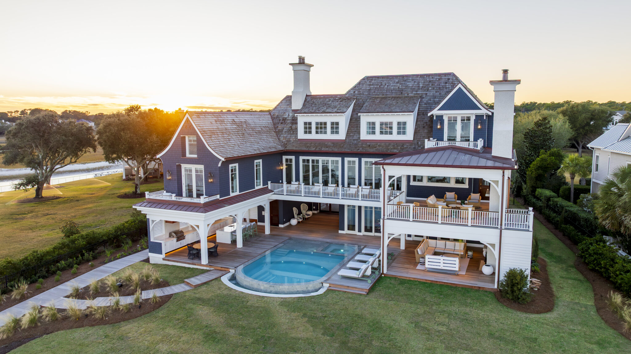 Project Inlet View, designed by CRAFT Architecture and built by Tongue & Groove, sitting at dusk along the Intracoastal Waterway.